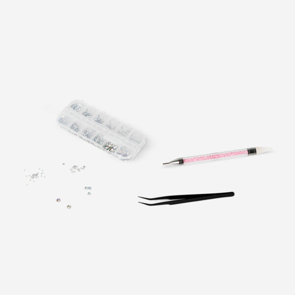 Kit för nageldekoration med strass och applikator